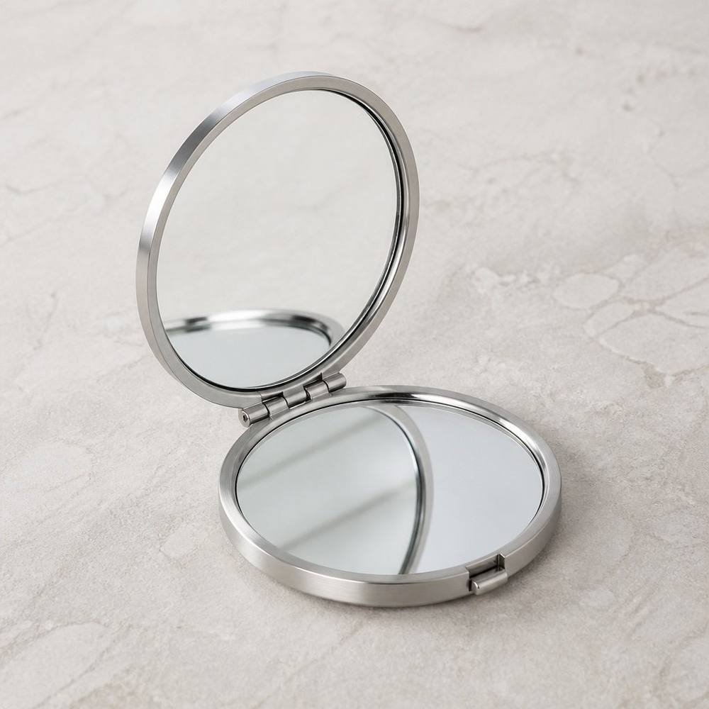 Miroir compact double face